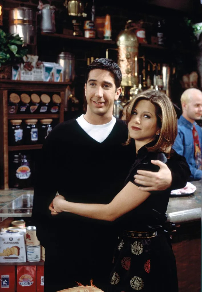 A generation later, people gathered around shows like "Friends" — different shows, different audiences, same basic mechanism. (NBCUniversal) NBCUniversal via Getty Images