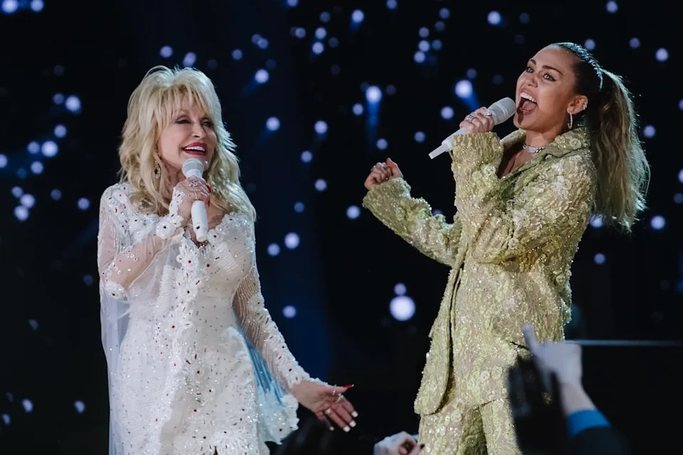 <p>11. After suffering abdominal bleeding in the early '80s, Parton underwent a partial hysterectomy, meaning she wouldn't be able to birth her own children. "God has a plan for everything," she shared in a 2017 <a href="https://www.today.com/popculture/dolly-parton-opens-about-not-having-kids-god-has-plan-t117546?cid=sm_npd_td_fb_ma" target="_blank"><em>Today</em></a> show interview. "I think it probably was his plan for me not to have kids so everybody's kids could be mine. And they are now."</p><p>12. Among her chosen brood: <a href="https://www.eonline.com/news/miley_cyrus" target="_blank"><strong>Miley Cyrus</strong></a>, Parton serving as her godmother onscreen in <em>Hannah Montana</em> and IRL. So the country legend wasn't shocked when she discovered they <a href="https://www.eonline.com/news/1407738/dolly-parton-has-the-best-reaction-after-learning-she-and-goddaughter-miley-cyrus-are-actually-related" target="_blank">shared a mutual great grandfather</a> named<strong> John Brickley</strong>. </p><p>"Well, we're so close, Miley and I," Parton noted to <em><a href="https://www.accessonline.com/videos/dolly-parton-learns-she-and-goddaughter-miley-cyrus-are-distant-cousins-see-her-sweet-reaction" target="_blank">Access Hollywood</a> </em>in 2024, "I thought we would have been at least third cousins, ten times removed."</p>