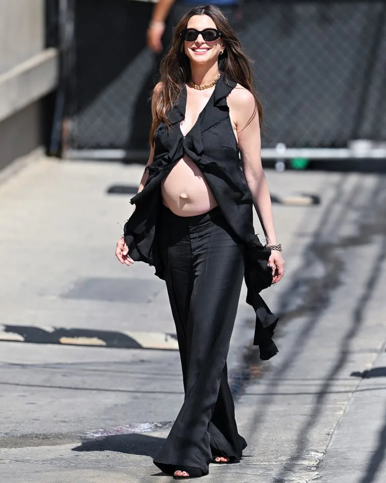 Anne Hathaway shows off baby bump outside of 'Jimmy Kimmel Live' in Los AngelesCredit: PG/Bauer-Griffin/GC Images