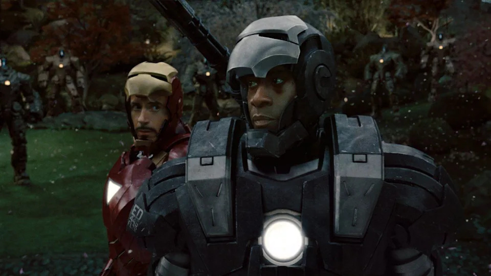don cheadle and robert downey jr as war machine and iron man