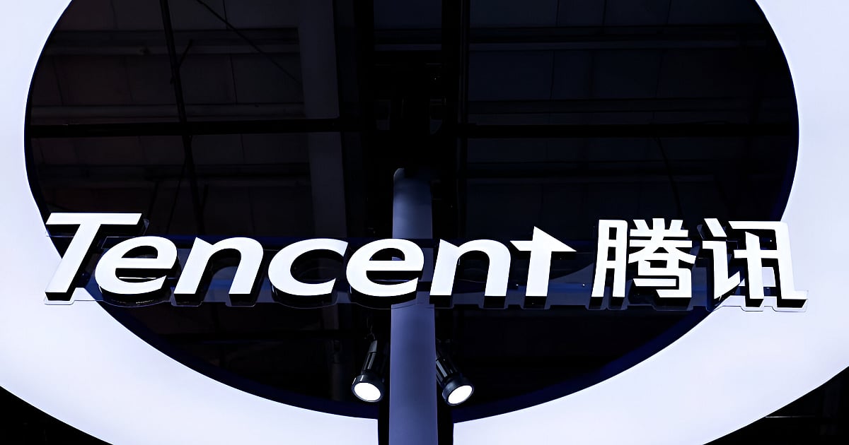Tencent logo displayed on a building exterior with the company's Chinese name alongside it.