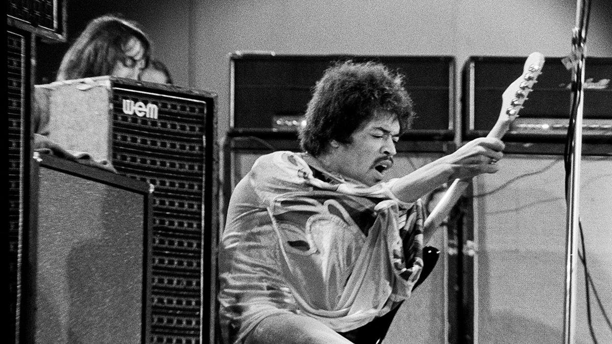 Jimi Hendrix performs at the Isle of Wight festival on August 29, 1970.