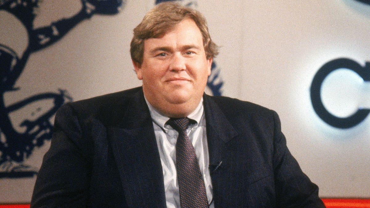 John Candy with Sportscaster Roy Firestone on