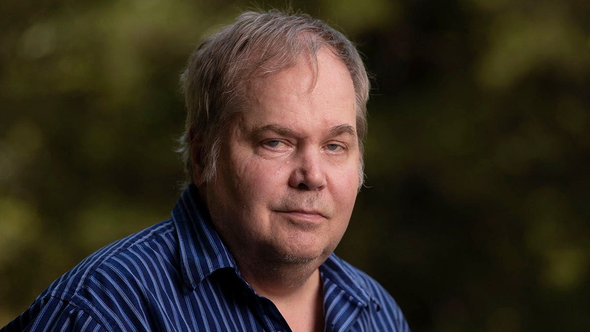 John Hinckley Jr. stands for a portrait in Williamsburg, Virginia.