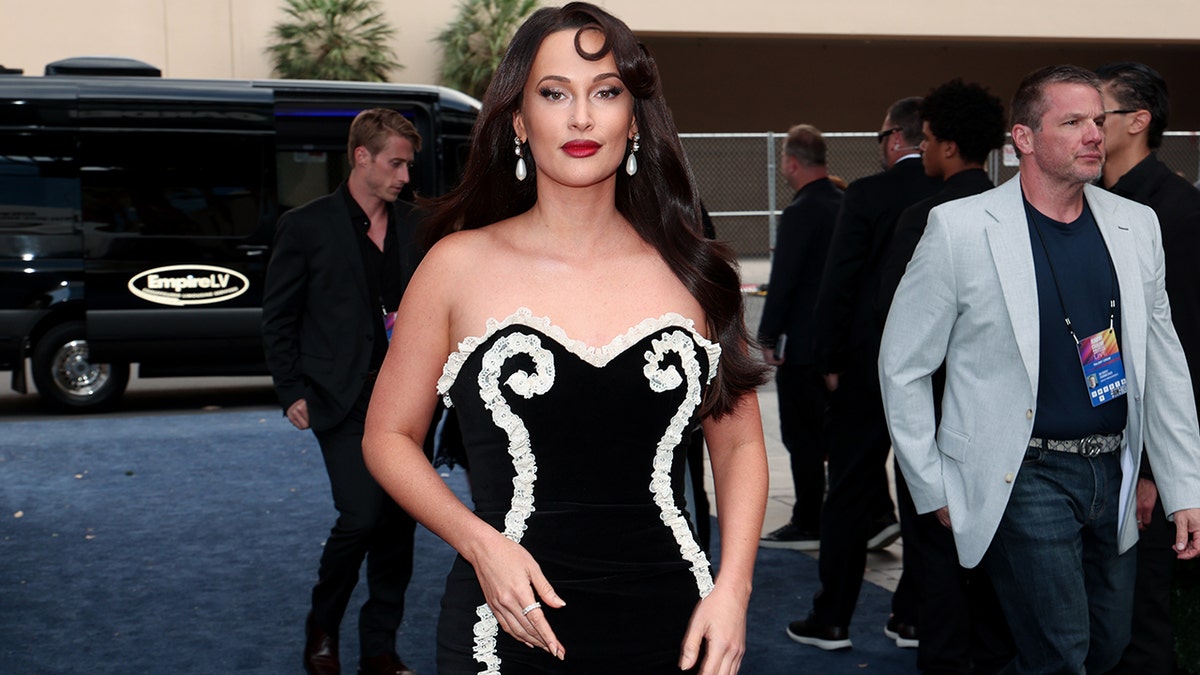 Kacey Musgraves poses on the carpet at the 2026 ACMS.
