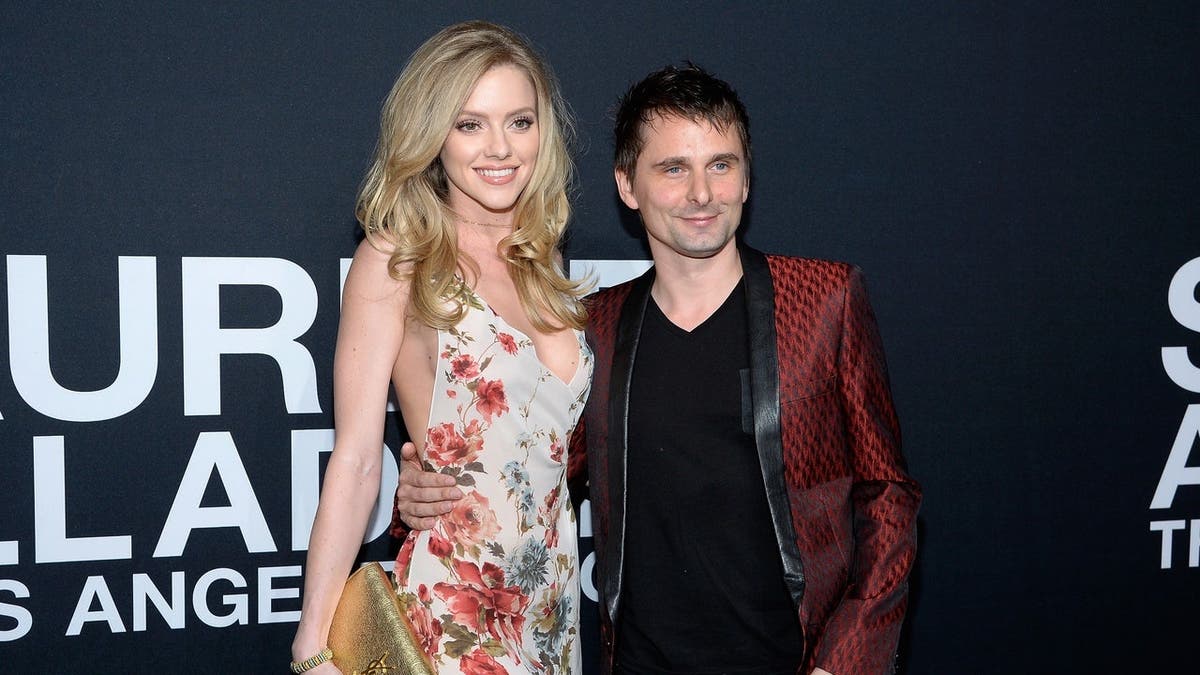 Elle Evans and Matt Bellamy arrive at the Saint Laurent show at The Hollywood Palladium in Los Angeles.