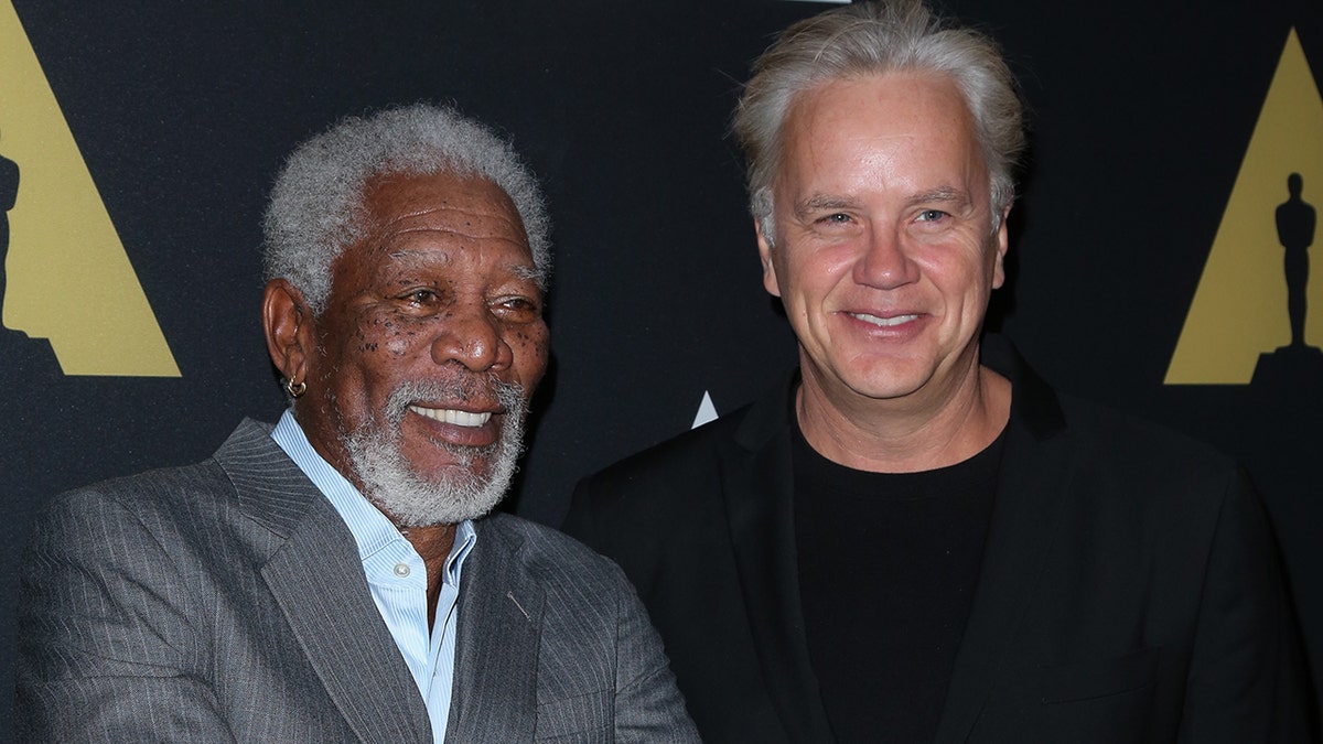Morgan Freeman poses for a photo with Tim Robbins