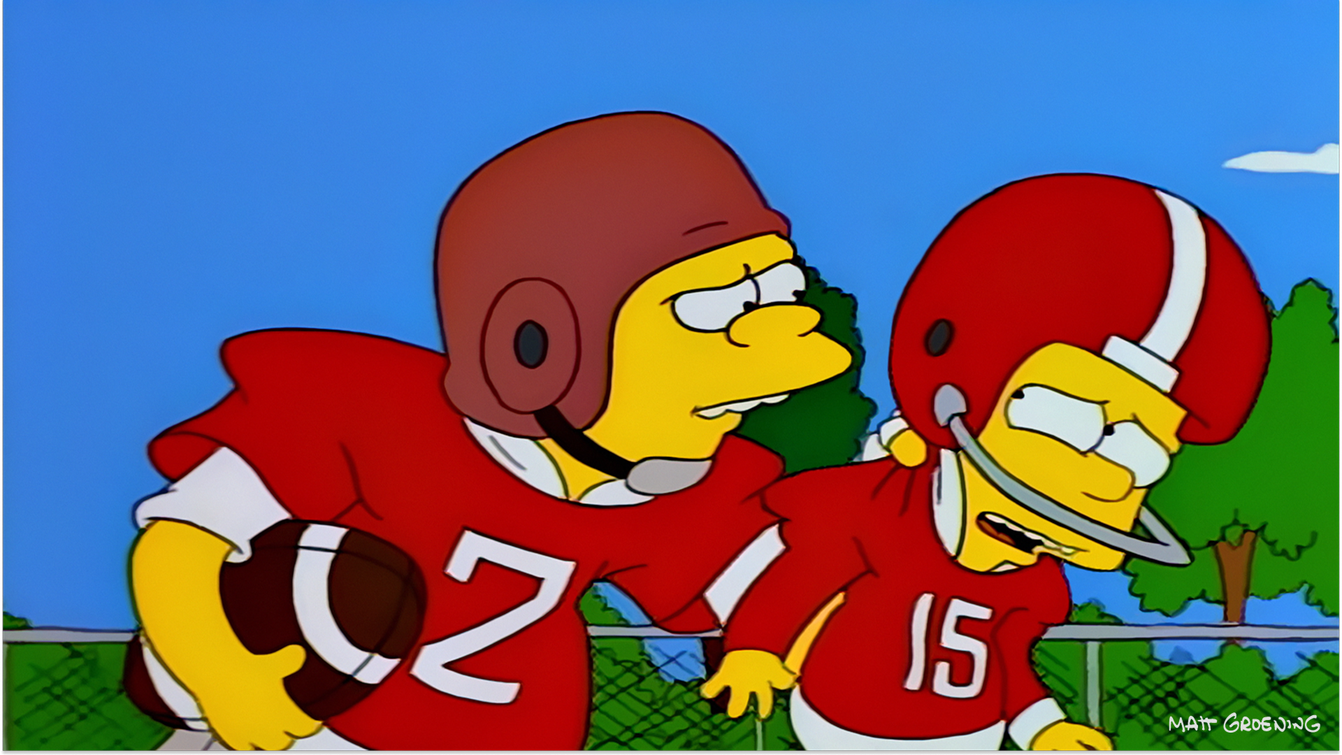 Nelson Muntz and Bart Simpson play football