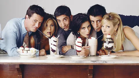Getty Images The six cast members of Friends sharing milkshakes - Matthew Perry, Jennifer Aniston, David Schwimmer, Courtney Cox, Matt LeBlanc and Lisa Kudrow (Credit: Getty Images)