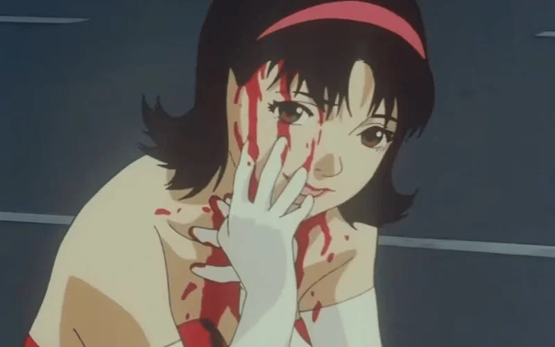 Mima with blood on her face in Perfect Blue.