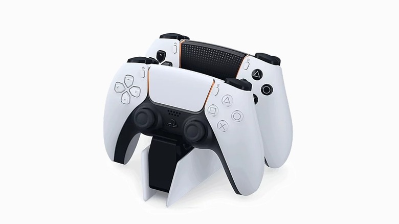 The PlayStation DualSense Charging Station with a DualSense and DualSense Edge controller docked
