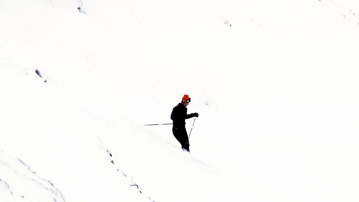Prince Charles skis down a snowy slope in Klosters, Switzerland.