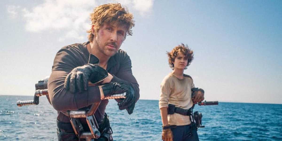 Ryan Gosling (L) and Flynn Gray (R) on a raft in the ocean on the set of 'Star Wars: Starfighter'