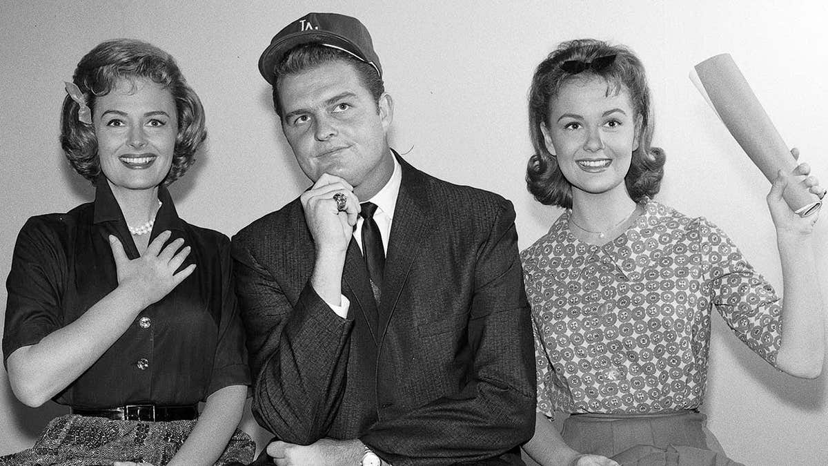 Donna Reed and Shelley Fabares stand with baseball player Don Drysdale.