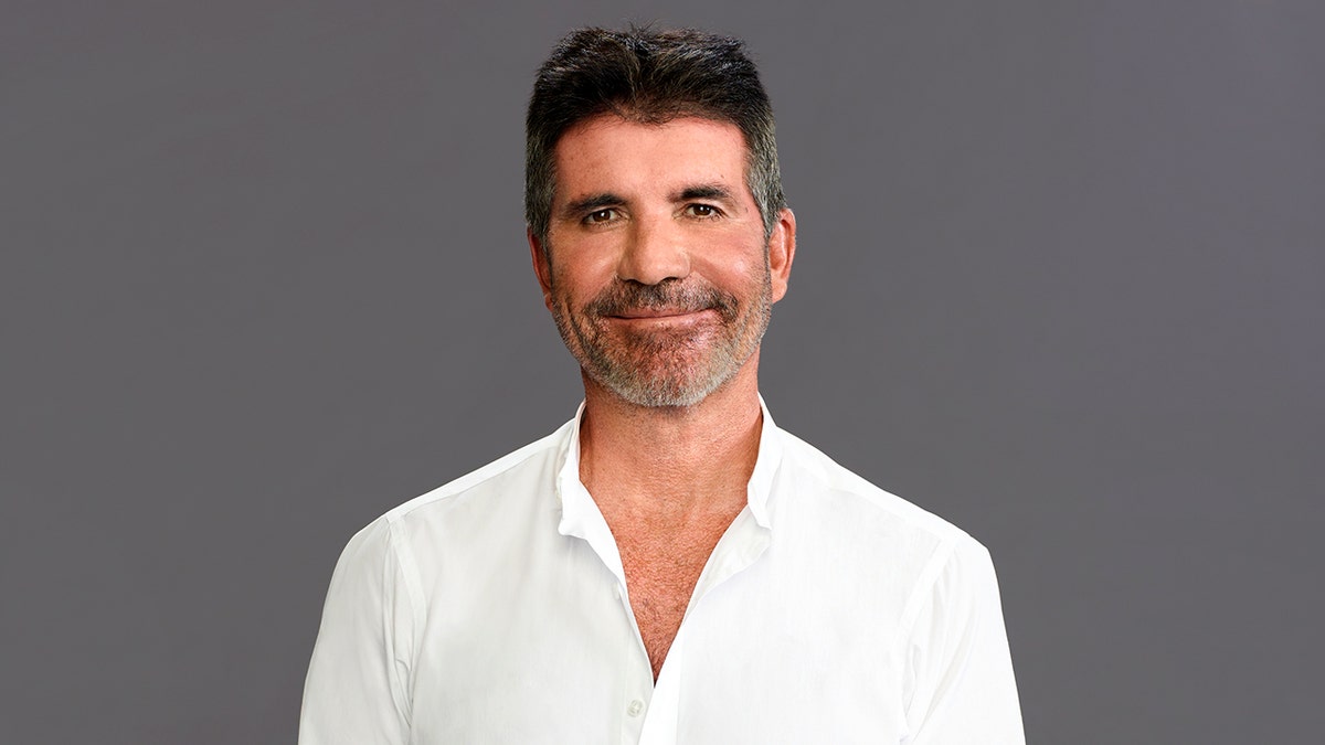 A headshot of Simon Cowell
