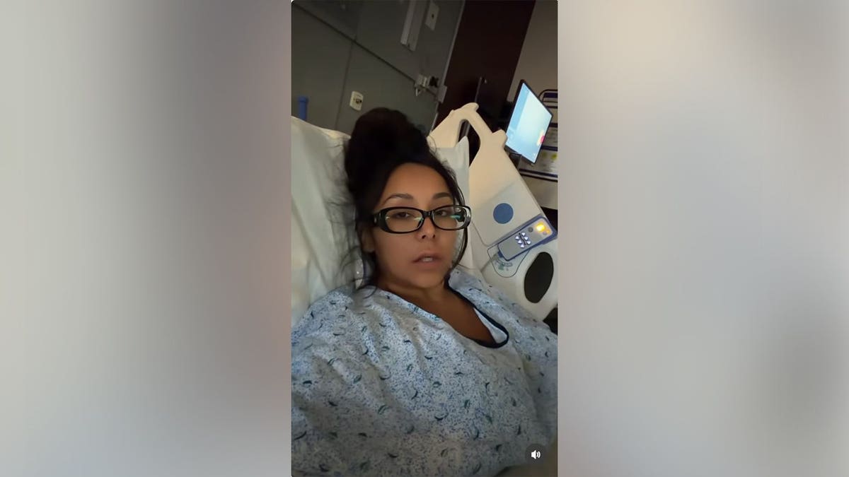 Nicole "Snooki" Polizzi in a hospital bed after her hysterectomy.