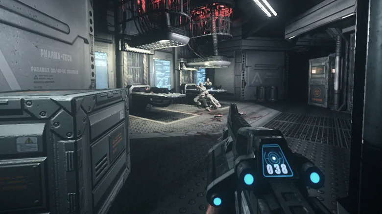 Richard B. Riddick aims at enemy soldiers in The Chronicles of Riddick: Assault on Dark Athena