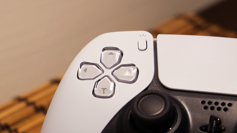 A close-up of the Create button on the DualSense controller