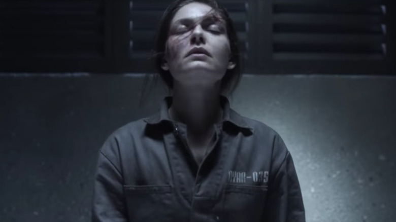 Alexa Davalos as Juliana looking up with her eyes closed in The Man in the High Castle