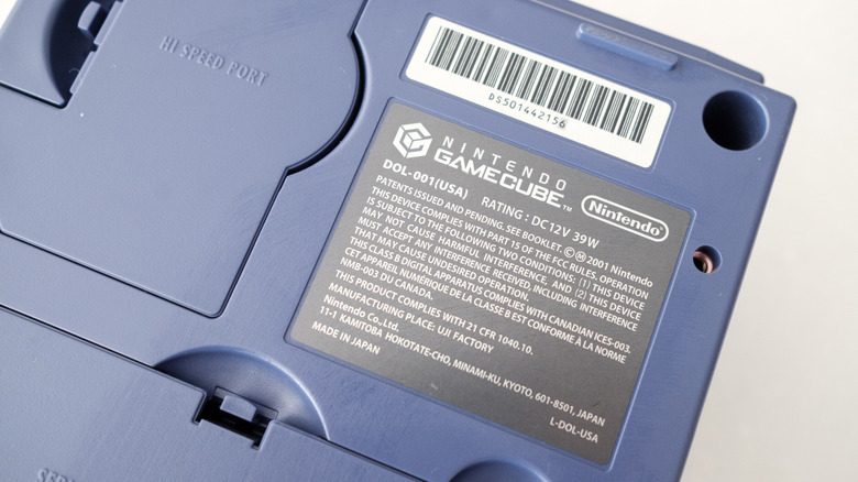 A closeup of the GameCube's back label, indicating the console is a DOL-001 model.