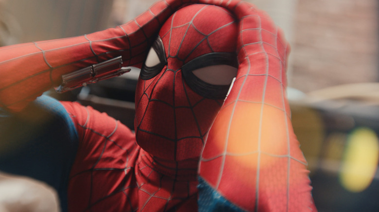 Spider-Man holding his head in Spider-Man: Brand New Day