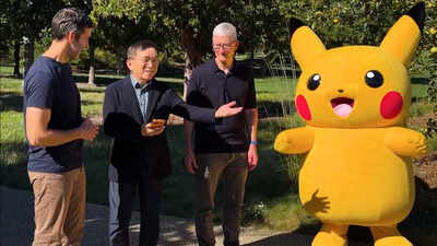 Tim Cook introduces incoming Apple CEO John Ternus to Pikachu during campus gaming meeting