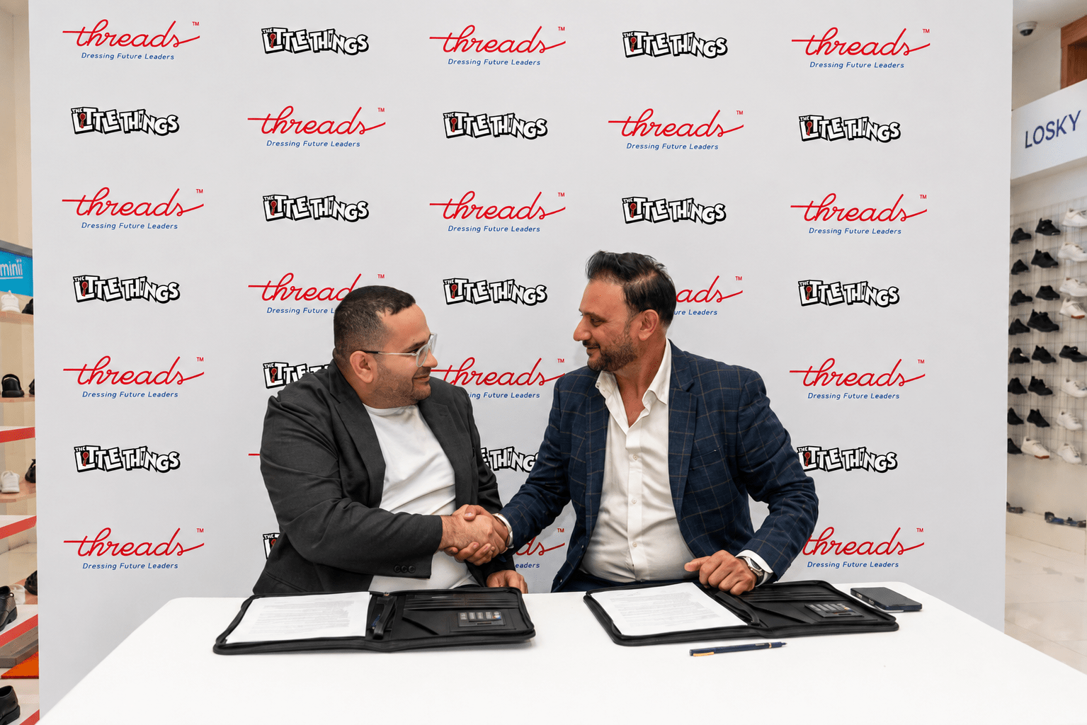 Hassan Tamimi and Latesh Radhakishen at the Threads and Scribble Street signing in Dubai