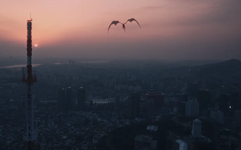 This is a companion concept video for Solo Leveling: Beyond the System, an upcoming theatrical film continuation of the anime. The image features a dragon flying high in the sky.