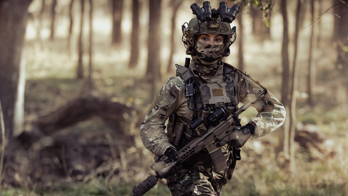 Zoe Saldaña as Joe stands in a scene from Lioness season 3.
