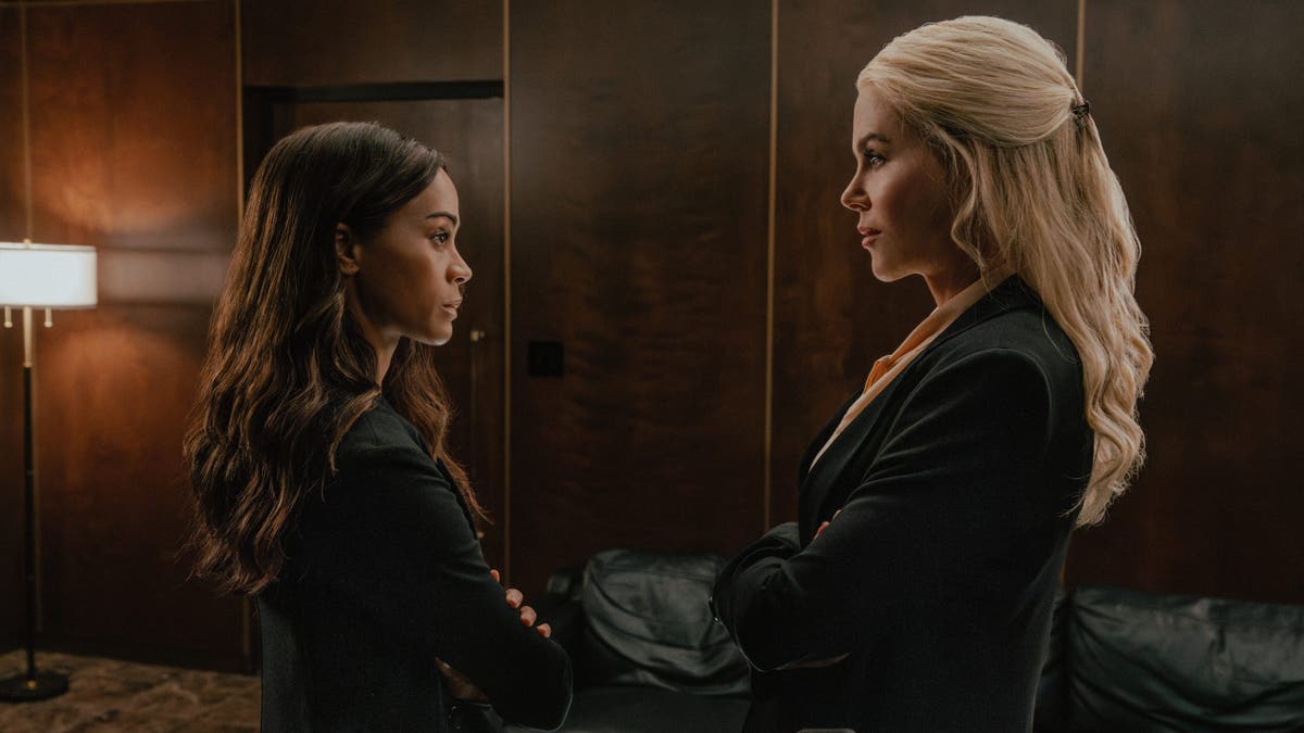 Zoe Saldaña and Nicole Kidman stand together in a scene from Lioness season 3.