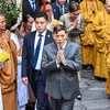 Thai king and queen pray for peace at Hanoi pagoda as state visit ends