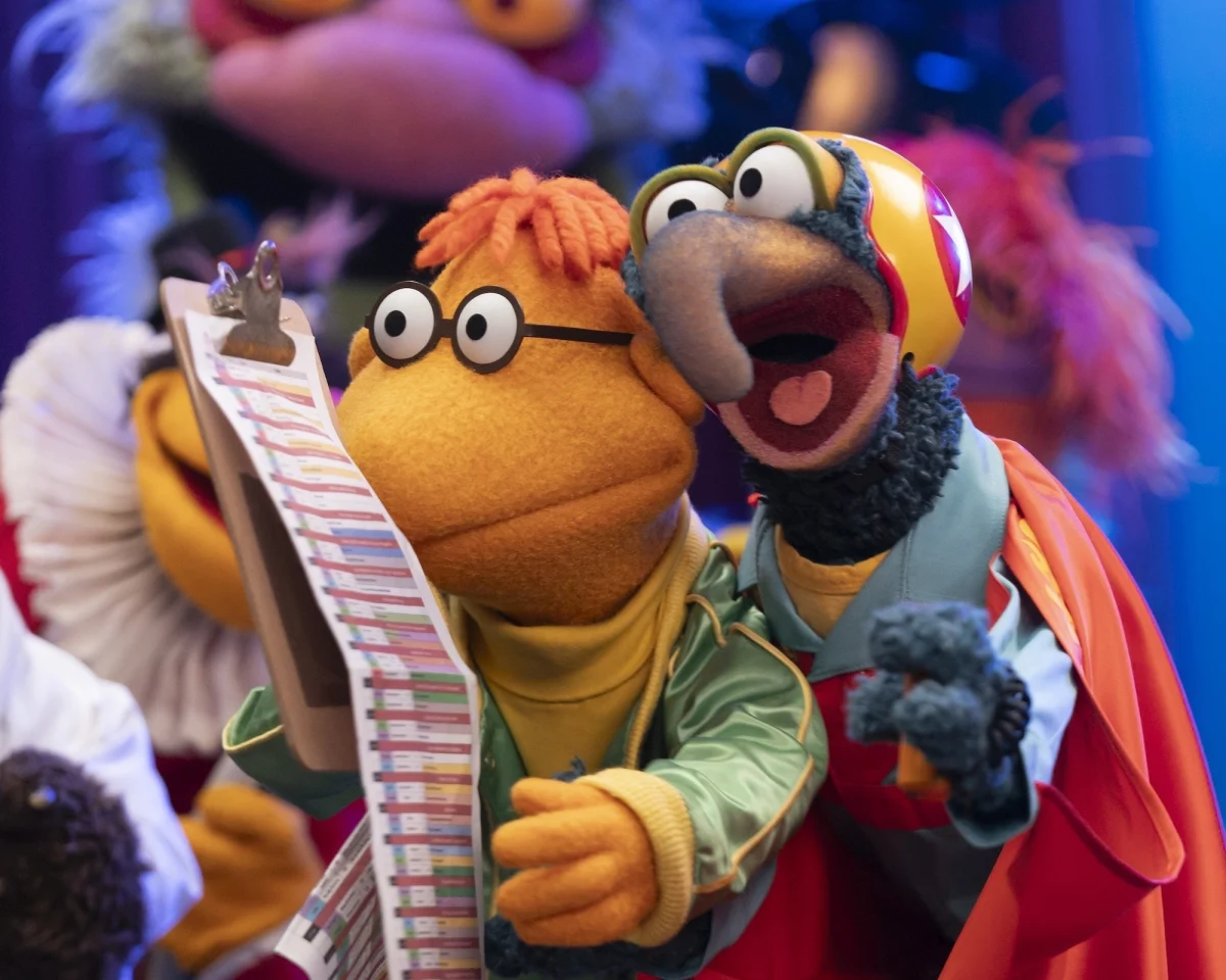 Gonzo hanging on Scooter on The Muppet Show
