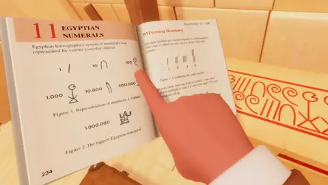 Pine Studio A character points at a book of Egyptian Numerals
