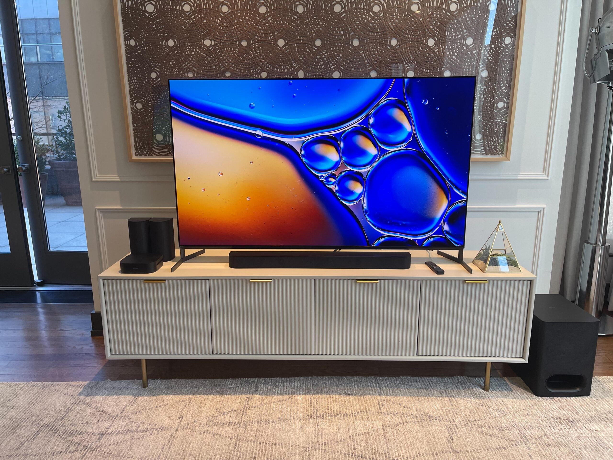 Sony Bravia 8 II sits on a TV bench