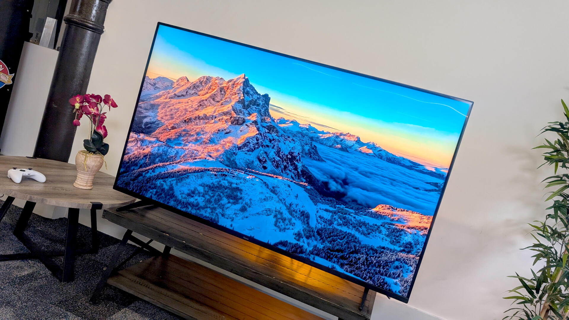 Roku Pro Series TV with snowy mountains on the screen