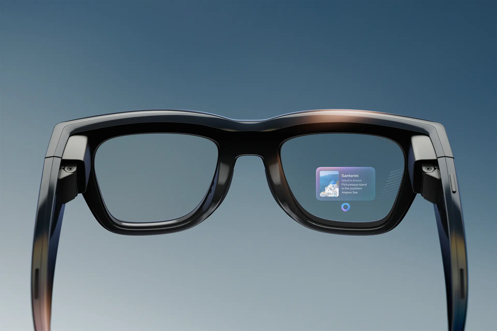 Meta Ray-Ban Display glasses seen from behind, with a card in the right lens reading Santorini, Island in Greece, Picturesque island in the southern Aegean Sea