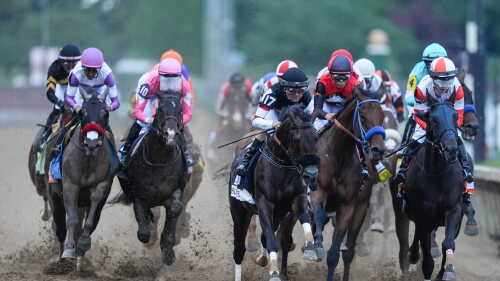 The field of the 2026 Kentucky Derby heads into the first turn during the Derby race at Churchill Downs. May 2, 2026.