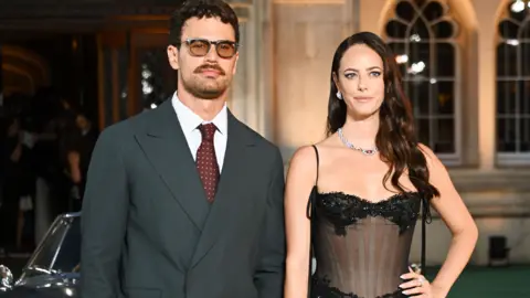 Getty Images LONDON, ENGLAND - SEPTEMBER 02: Theo James and Kaya Scodelario attend the World Premiere of "The Gentlemen" Season Two at Guildhall on September 2, 2026 in London, England. (Photo by Dave Benett/WireImage)