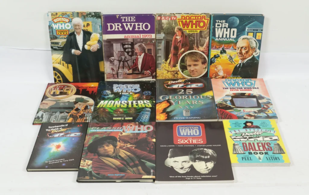 Vectis Auction Lot 15/9/26: Doctor Who, a quantity of hardback annuals, illustrated paperback books and similar. The lot comprises: • Doctor Who Yearbook 1995 • The Dr Who Annual 1973 • BBC tv Doctor Who Annual • The Dr Who Annual • BBC tv K-9 Annual 1983 • Doctor Who: A Book of Monsters • Doctor Who: 25 Glorious Years • Doctor Who: The Doctor Who File • Encyclopedia of the Worlds of Doctor Who A-D • Classic Who: The Hinchcliffe Years • Doctor Who: The Sixties • The Official Doctor Who & The Daleks Book Condition appears Good to Excellent.