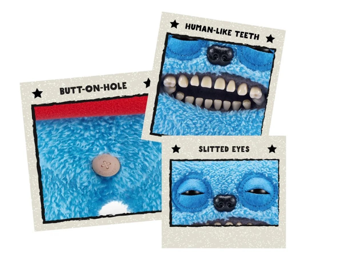 The teeth, eyes, and Button-hole of the DC Comics/Superman Fuggier plushie.