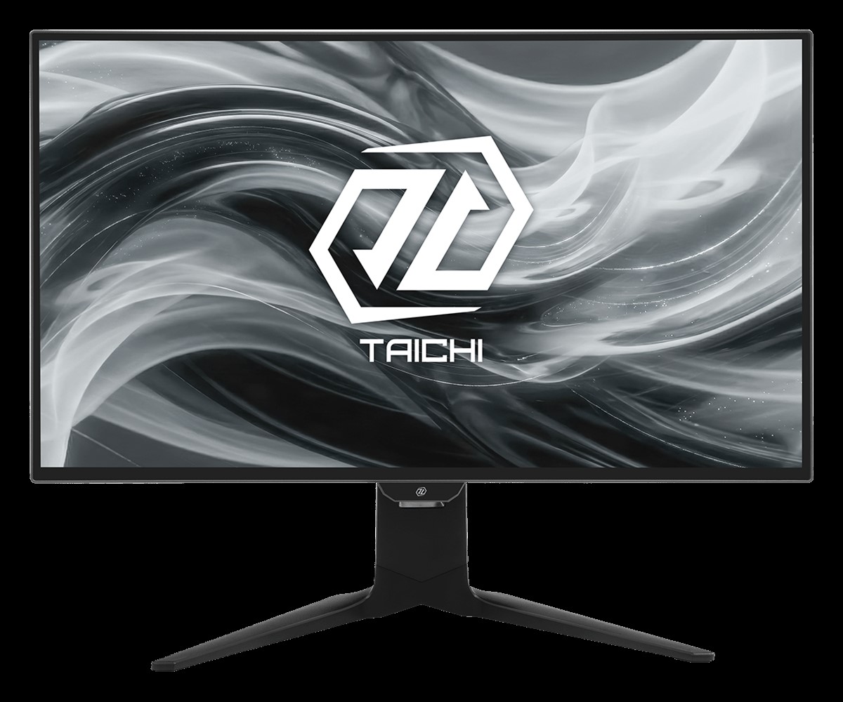 A computer monitor displaying the ASRock Taichi logo on a black and white abstract background.