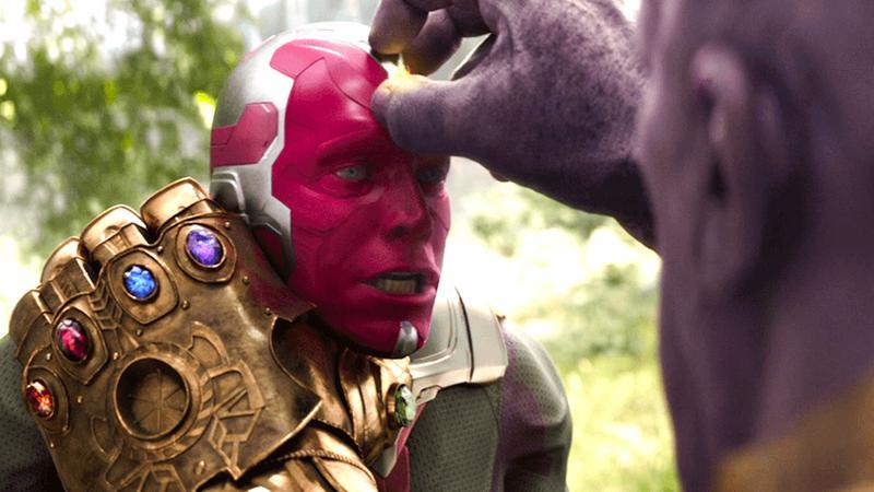 Thanos ripping the Mind Stone from Vision's head.