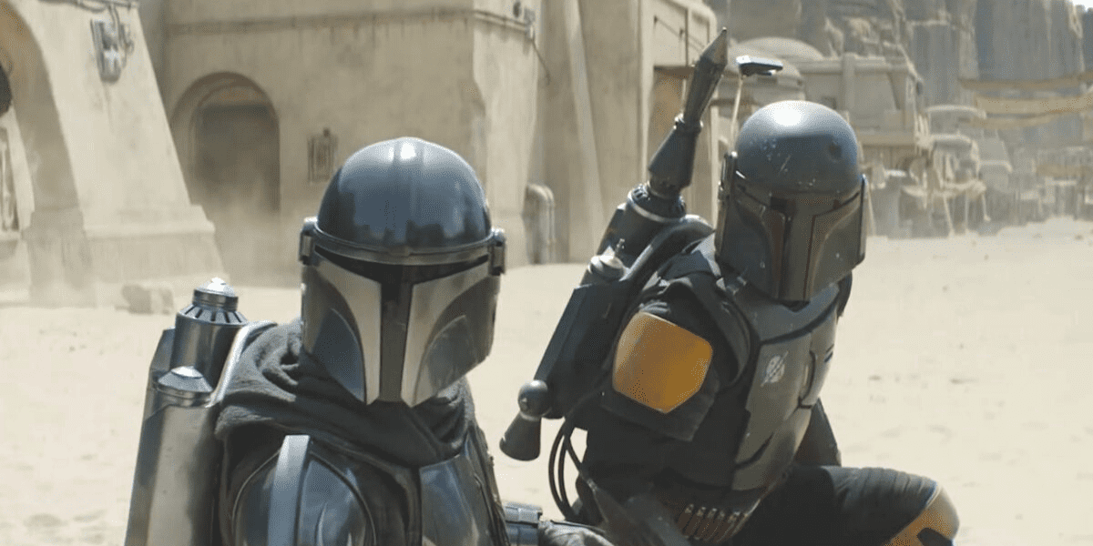 Pedro Pascal as Din Djarin (left) and Temeura Morrison as Boba Fett (right)
