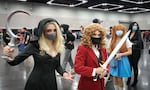 Sydney Gore and Ellie Gossett pose in cosplays for Rose City Comic Con in Portland, Ore., on Sept. 10, 2022, like many attendees at the annual convention.