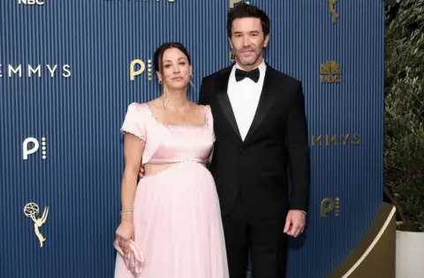 Getty Images Kaley Cuoco and Tom Pelphrey attend the 78th Primetime Emmy Awards at Peacock Theater on September 14, 2026 in Los Angeles, California.