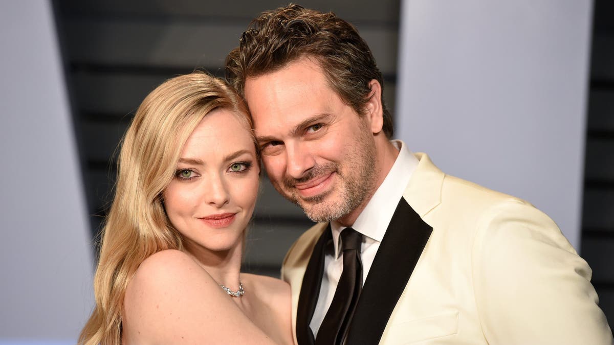 Amanda Seyfried and Thomas Sadoski at the 2018 Vanity Fair Oscar Party.
