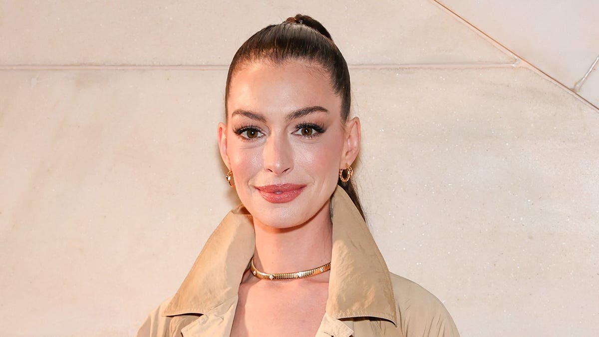 Anne Hathaway standing at Ralph Lauren Collection Fall 2025 event in New York City