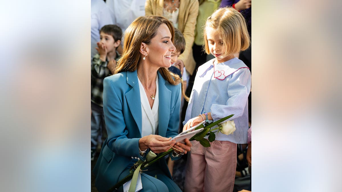 Catherine Princess of Wales interacting with children at a preschool in Reggio Emilia Italy