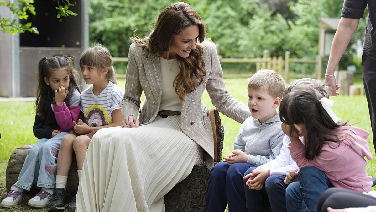 Catherine Princess of Wales speaking to children at Salvador Allende Scuola dell'infanzia in Reggio Emilia Italy