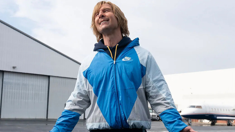 Glen Powell as Chad Powers, walking away from a plane in "Chad Powers."